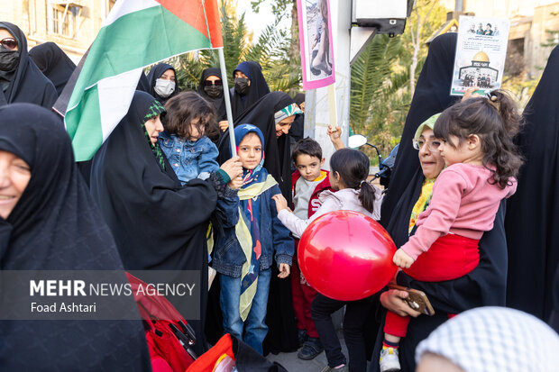 Iranian women gather in front of UK embassy