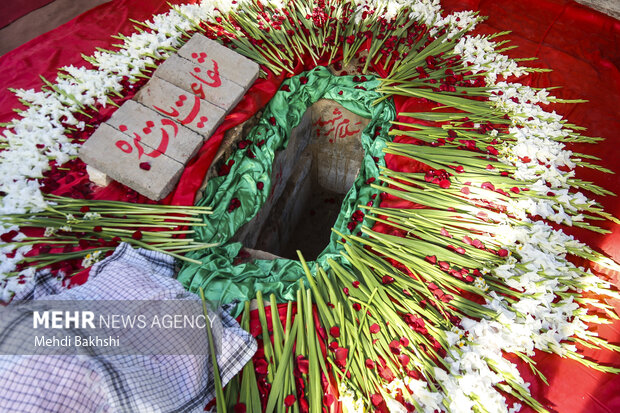 خاکسپاری شهید گمنام در حوزه علمیه خواهران قم