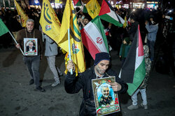 People celebrate victory in Palestin Sq. over Gaza truce deal