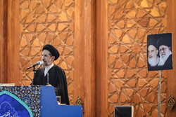 Worshippers perform Friday prayers at Imam Khomeini Mausoleum