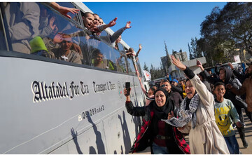 Freed Palestinian prisoners celebrate as they return to Khan Younis, in Gaza