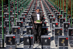 غبارروبی مزار شهدا در پنجشنبه آخر سال - همدان
