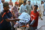 Passenger truck falls into a ravine in Pakistan, killing 13