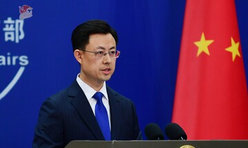 China urges US to stop threatening , blackmailing