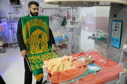 عیادت خادمان رضوی از بیماران کرمانشاهی