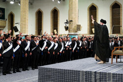 Leader receives group of workers for meeting