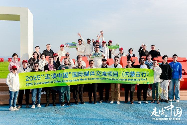 International journalists pose for a photo on May 13 2025 in the Chilechuan Grassland in Hohhot in Inner Mongolia