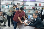 Erakçi Tahran Kitap Fuarı'nı ziyaret etti