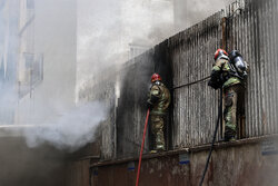 Fire erupts in warehouse of Asia Insurance Building in Tehran