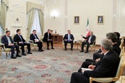 Iran favors talks while it will never accept bullying