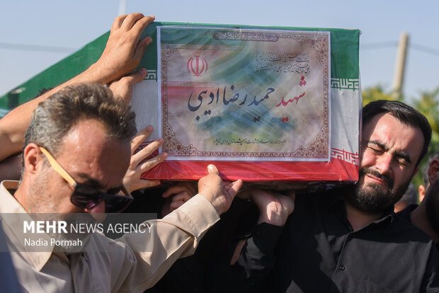 تشییع پیکر شهید راه وطن «حمیدرضا ادیب» در کرج