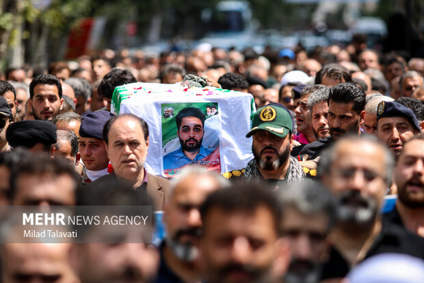 مراسم تشییع پیکر سرباز شهید مهران منوری در فومن