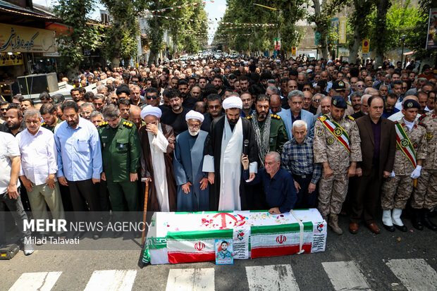 مراسم تشییع پیکر سرباز شهید مهران منوری در فومن