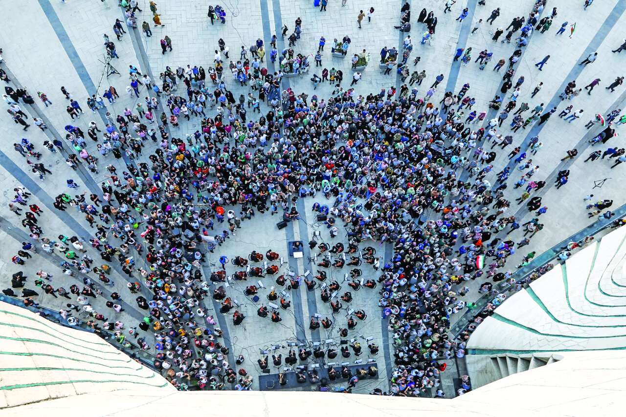 Tehran Symphony Orchestra, led by maestro Nasir Heidarian, dazzles audiences with a free concert at Tehran's Azadi Tower on June 25, 2025.
