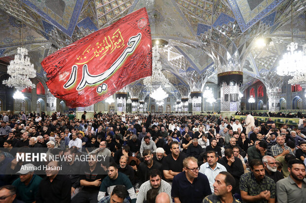 وداع با پیکر 13 شهید جنایت رژیم صهیونیستی در حرم امام رضا (ع)