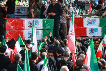 Millions mourn fallen commanders, scientists in Tehran funeral