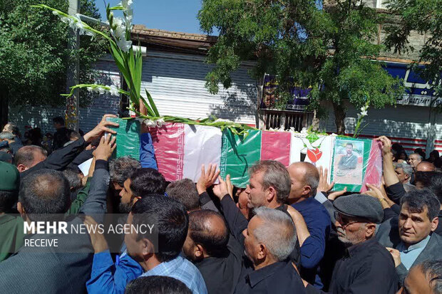 تشییع پیکر شهید راه وطن «حسن احمدی» در زاوه