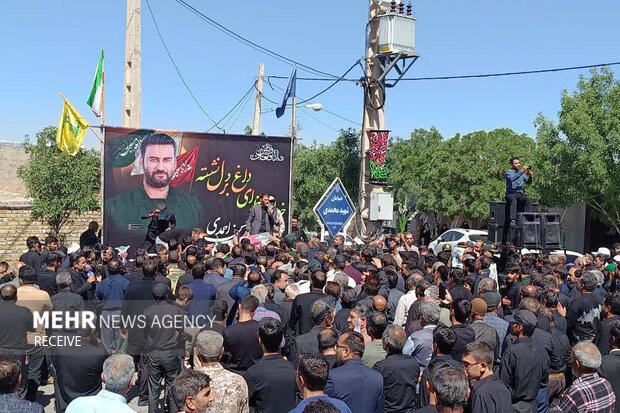 تشییع پیکر شهید راه وطن «حسن احمدی» در زاوه