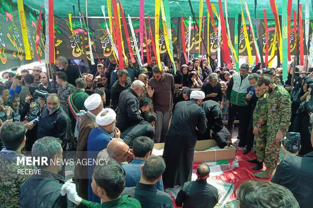 تشییع پیکر شهید راه وطن «حسن احمدی» در زاوه