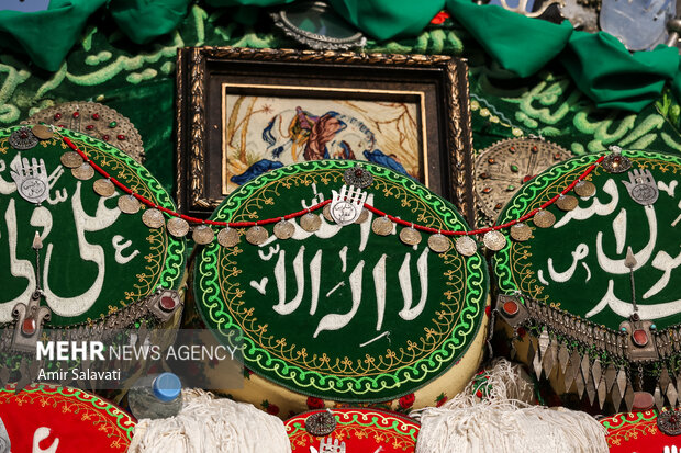 آیین نخل‌گردانی تاسوعا در مهدیشهر