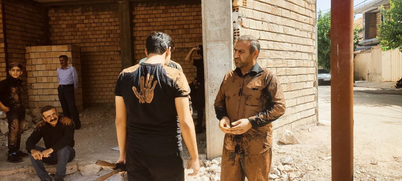 آیین گلمالی در هیئت ۷۲ تن درهشهر+عکس