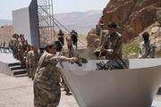 PKK fighters destroy weapons at key ceremony