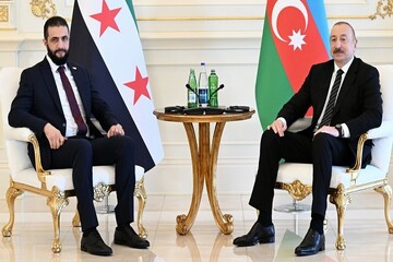 Azeri president receives Syria's interim ruler in Baku
