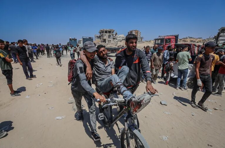 Israel kills at least 1,760 people seeking aid in Gaza