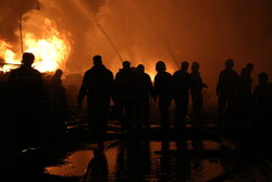 Massive fire at auto oil warehouse in south Tehran