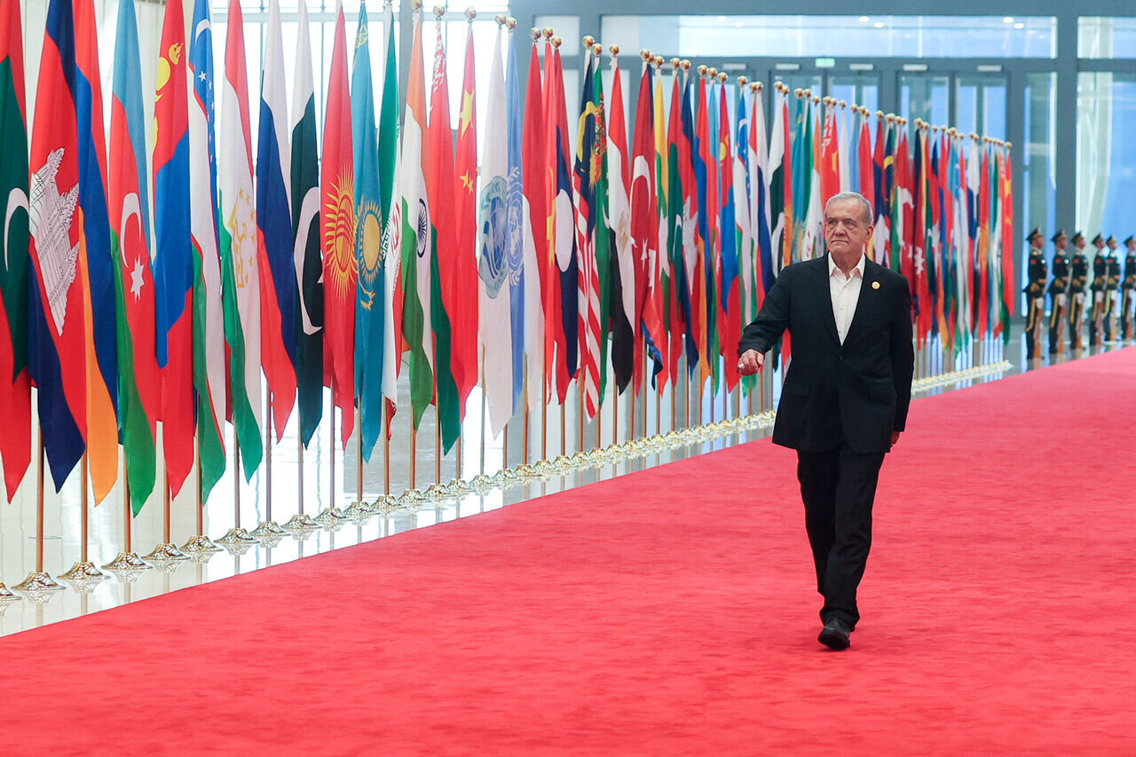 Iran President arrives in Beijing for historic celebration