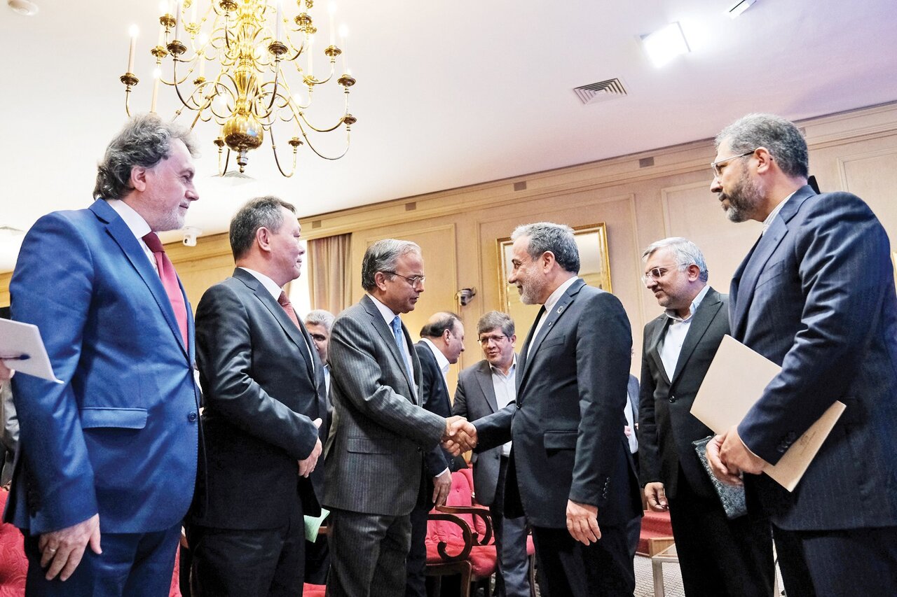 FM Araghchi shakes hands with participants of Iran-ECO Conference on September 16, 2025.