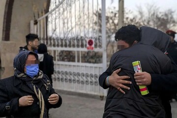 A released inmate reunites with a family member outside the jail (file photo).