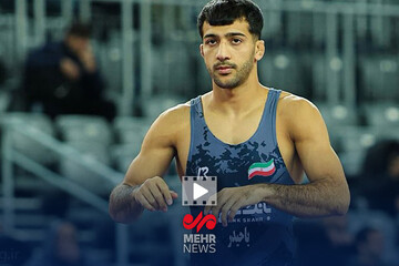 کشتکار حریف چینی را برد و صعود کرد