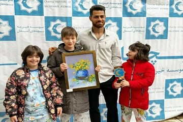 Persepolis defender Pouraligani visits children at rehabilitation center