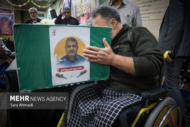 مراسم تشییع جانباز ۷۰ درصد دوران دفاع مقدس «حسن بهرام‌فر»در مشهد