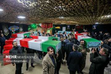 Mass funeral of 300 unidentified martyrs in Iran