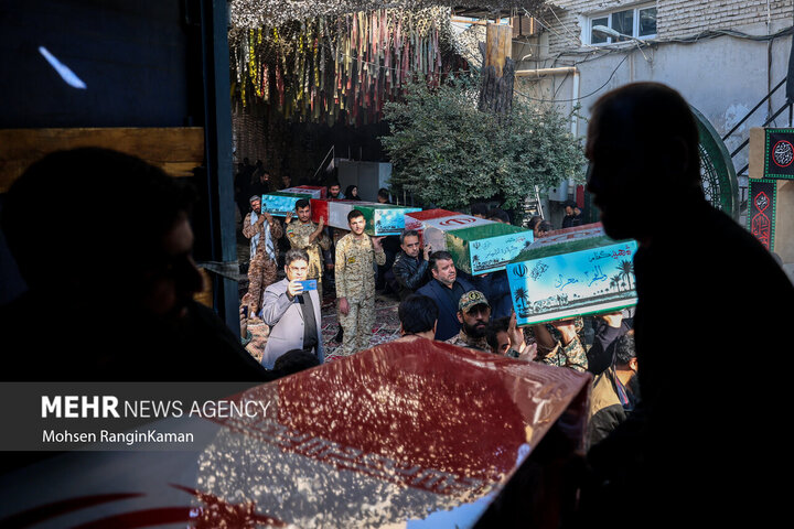 Mass funeral of 300 unidentified martyrs in Iran
