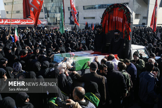 مراسم تشییع پیکر ۱۳ شهید گمنام دفاع مقدس در مشهد