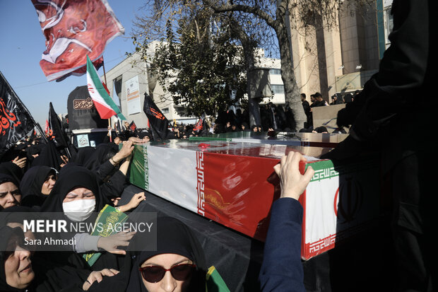 مراسم تشییع پیکر ۱۳ شهید گمنام دفاع مقدس در مشهد