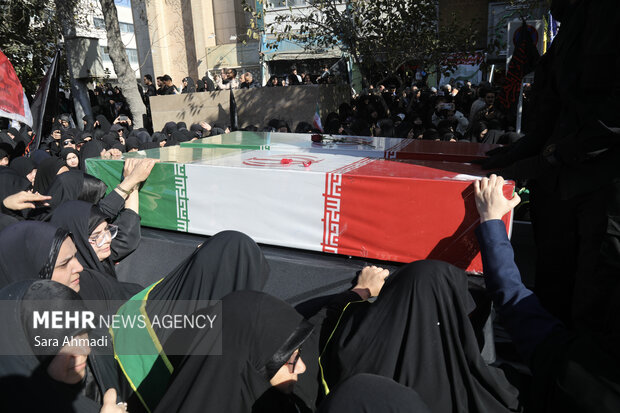 مراسم تشییع پیکر ۱۳ شهید گمنام دفاع مقدس در مشهد