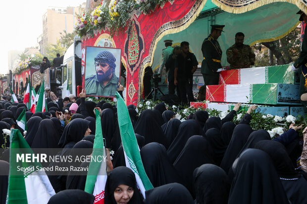 مراسم تشییع پیکرهای 100 شهید گمنام دوران دفاع مقدس در تهران 8