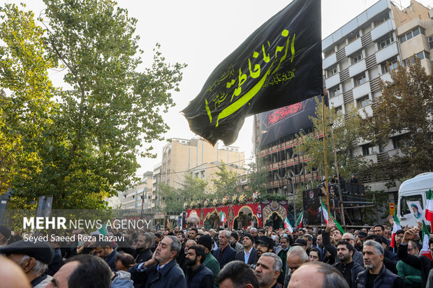 مراسم تشییع پیکرهای 100 شهید گمنام دوران دفاع مقدس در تهران 12