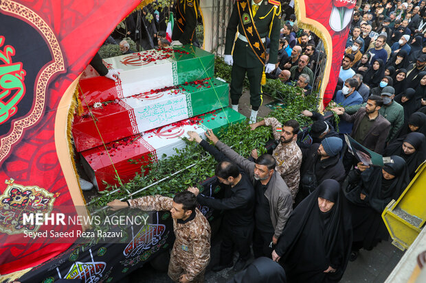 مراسم تشییع پیکرهای 100 شهید گمنام دوران دفاع مقدس در تهران 26