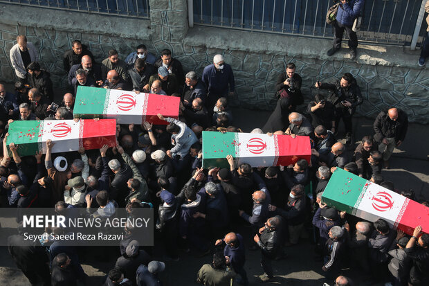 مراسم تشییع پیکرهای 100 شهید گمنام دوران دفاع مقدس در تهران 30