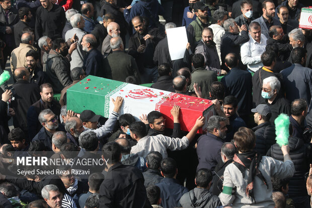 مراسم تشییع پیکرهای 100 شهید گمنام دوران دفاع مقدس در تهران 49