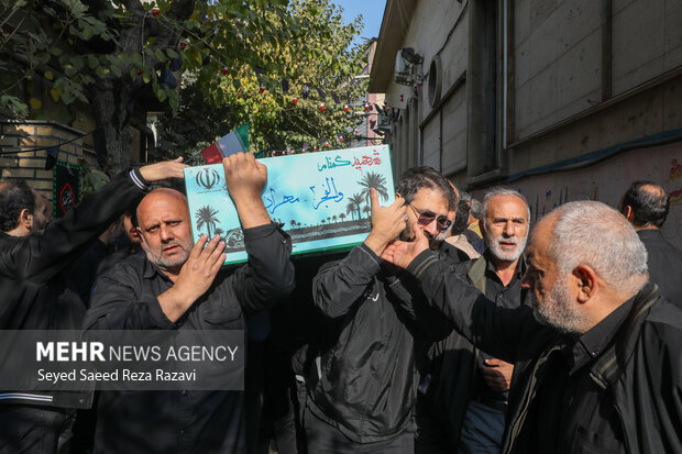 مراسم تشییع پیکرهای 100 شهید گمنام دوران دفاع مقدس در تهران 66