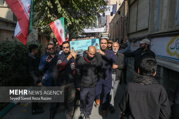 مراسم تشییع پیکرهای 100 شهید گمنام دوران دفاع مقدس در تهران 69