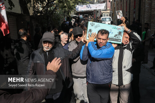 مراسم تشییع پیکرهای 100 شهید گمنام دوران دفاع مقدس در تهران 70