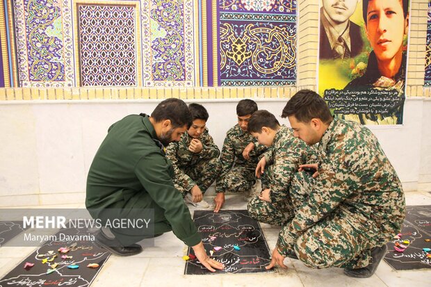 گلباران مزارشهدا به مناسبت هفته بسیج در بجنورد