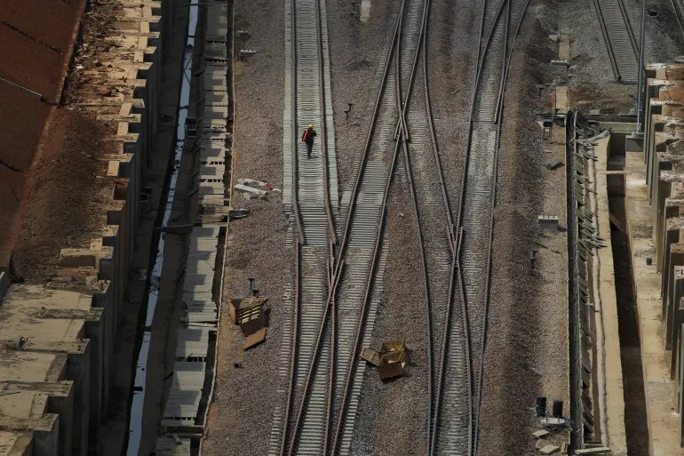 V železniški nesreči na Kitajskem umrlo 11 vzdrževalcev